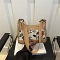 Retro khaki PU leather shoulder bag with floral fabric panel and wide strap design - Khaki