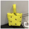 Quilted yellow toiletry bag with black bow embroidery and silver metal snap button - Yellow