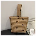 Quilted khaki tote bag with black bow embroidery and silver magnetic buckle closure - Khaki