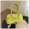 Neon green vintage bowling handbag in smooth synthetic leather with gold hardware - Green