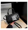 Black crocodile embossed patent leather handbag with silver BL logo and thin shoulder strap - Black