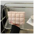 Minimalist light pink puffy quilted makeup pouch in waterproof nylon fabric for women - Pink
