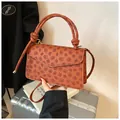 Brown retro square crossbody bag with clover embossed patterns and knotted top handle - Dark Brown