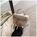 Sac à main boîte chic beige et marron en toile tissée avec des poignées en cuir - Kaki