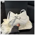Chic white underarm bag with parallel metal buckles on premium matte leather finish - White