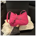 Chic magenta leather underarm bag with unique buckle strap shown in premium gift packaging - Rose Red