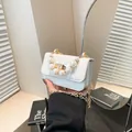 Mini white crocodile-embossed pearl handle handbag with gold chain strap for women - White