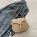 Chic khaki saddle shoulder bag with light gold buckle and faux leather strap - Khaki