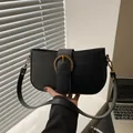 Minimalist black leather underarm bag with vintage gold buckle for women - Black