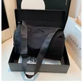 Black large capacity nylon messenger bag with crinkle texture and wide shoulder strap - Black