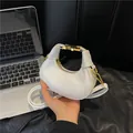 Mini white crescent handbag with gold H hardware and chain strap for crossbody wear - White