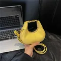 Bright yellow mini crescent bag with chain strap and gold hardware accents - Yellow