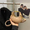 Chic beige crescent mini bag with gold chain strap for elegant crossbody styling - Khaki