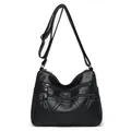 Women's black PU leather crossbody bag with quilted pattern and multi-zipper pockets - Black