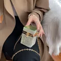 Mini silver rhinestone evening bag with green transparent top and gold chain strap - Green