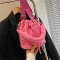 Pink plush bucket bag with The Bucket embroidery and adjustable wide shoulder strap - Rose Red