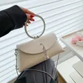 Elegant cream jelly handbag with diamond-encrusted round handle and silver chain strap - Large / Off White