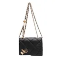Black quilted crossbody bag with gold chain strap and decorative sphere accent - Black