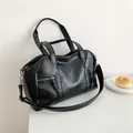 Minimalist black PU leather tote bag with dual handles and silver hardware detailing - Black