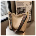Minimalist beige hobo tote bag with bohemian pattern wide strap and gold hardware - Off White