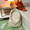Leuke beige minimalistische schoolrugzak met meerdere zakken en een zachte interieurstijl - Wit