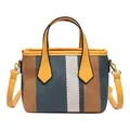 Blue and beige striped woven bucket bag with bright yellow leather straps and handles - Green
