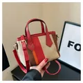 Mini striped canvas bag in red and orange with woven texture and leather handle - Red