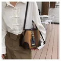 Retro striped bucket bag in brown, khaki and dark green knit with leather trim - Brown