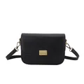 Retro black faux leather shoulder bag with gold rectangular buckle on white background - Black