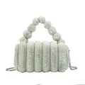 Faux fur handbag in light green with vertical stripes and fluffy ball handle strap - Green