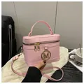 Pink leather box bag with golden M metal hardware and adjustable shoulder strap - Pink