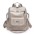 Detail of multi-functional PU leather backpack showing side pockets and metal hardware - Mixed Khaki