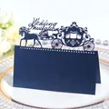 Dark blue laser-cut wedding seat card featuring a pumpkin carriage and horse design - Sapphire Blue