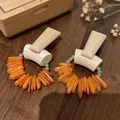 2604215 Orange Seashell Crystal Beaded Wooden Earrings