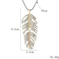 Collier bohème doré avec pendentif feuille en cristal, chaîne 70cm et strass brillants - Or