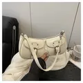 Chic beige underarm bag with double front pockets and adjustable shoulder strap - White