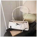 Creamy white pillow bag with chic black bows and a decorative lace pearl pendant - With Pendant / White