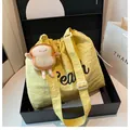 Bright yellow drawstring tote bag with black Beach lettering and cute plush toast charm - With Pendant / Yellow