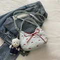 Light blue quilted mini tote bag with a large red bow and a cute plush bear charm - With Pendant / Light Blue