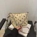 Beige litchi grain bucket bag with cartoon bear print and silver metal chain strap - Khaki