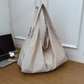 Large apricot pleated nylon tote bag for women showing spacious interior and texture - Off White