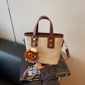 Mini canvas tote bag with brown leather trim and cute monster plush charm - With Pendant / White