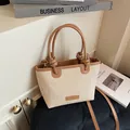 Beige Stroh-Stofftasche mit braunem Lederbesatz und Knotendetail an den Griffen - Khaki