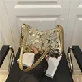 Chic gold sequin underarm bag with silver chain detail and leather shoulder strap - Gold
