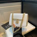 White croc-effect small square shoulder bag with heart lock and gold chain strap - White