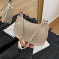 Elegant champagne gold hobo bag featuring shimmering rhinestones and a metal zipper - Champagne