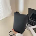 Retro black litchi pattern leather bucket bag for daily casual or office commuting style - Black