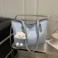 Light blue embroidered canvas tote bag with a white plush cloud charm and metal logo - With Pendant / Blue