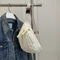 Minimalist white corduroy crossbody bag with adjustable strap and buckle for casual wear - White