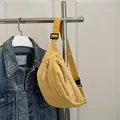 Vibrant yellow corduroy waist bag with adjustable strap and textured striped finish - Yellow